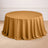 Round mustard tablecloth draped elegantly over a circular table.