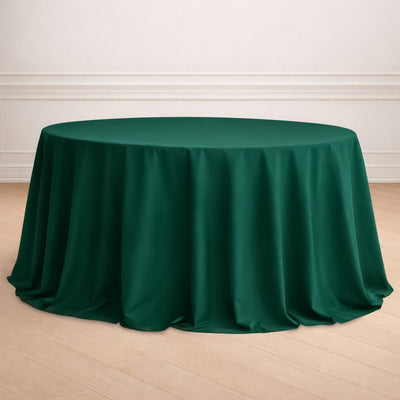 Green round tablecloth draped elegantly over a table.