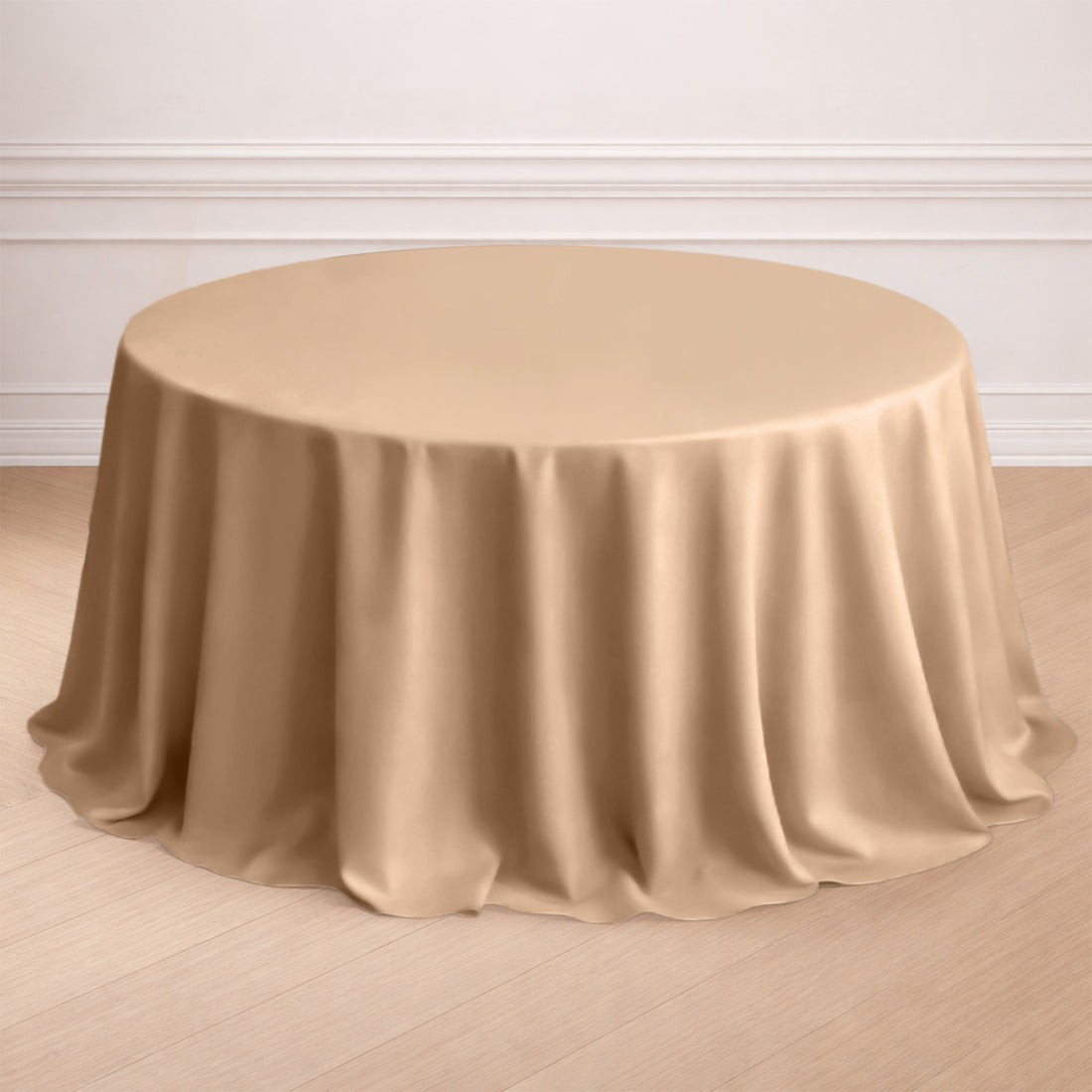 Beige round tablecloth draping elegantly over a circular table.