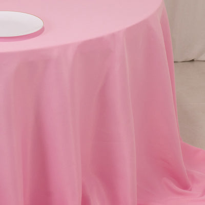 Pink tablecloth draped elegantly over a table.