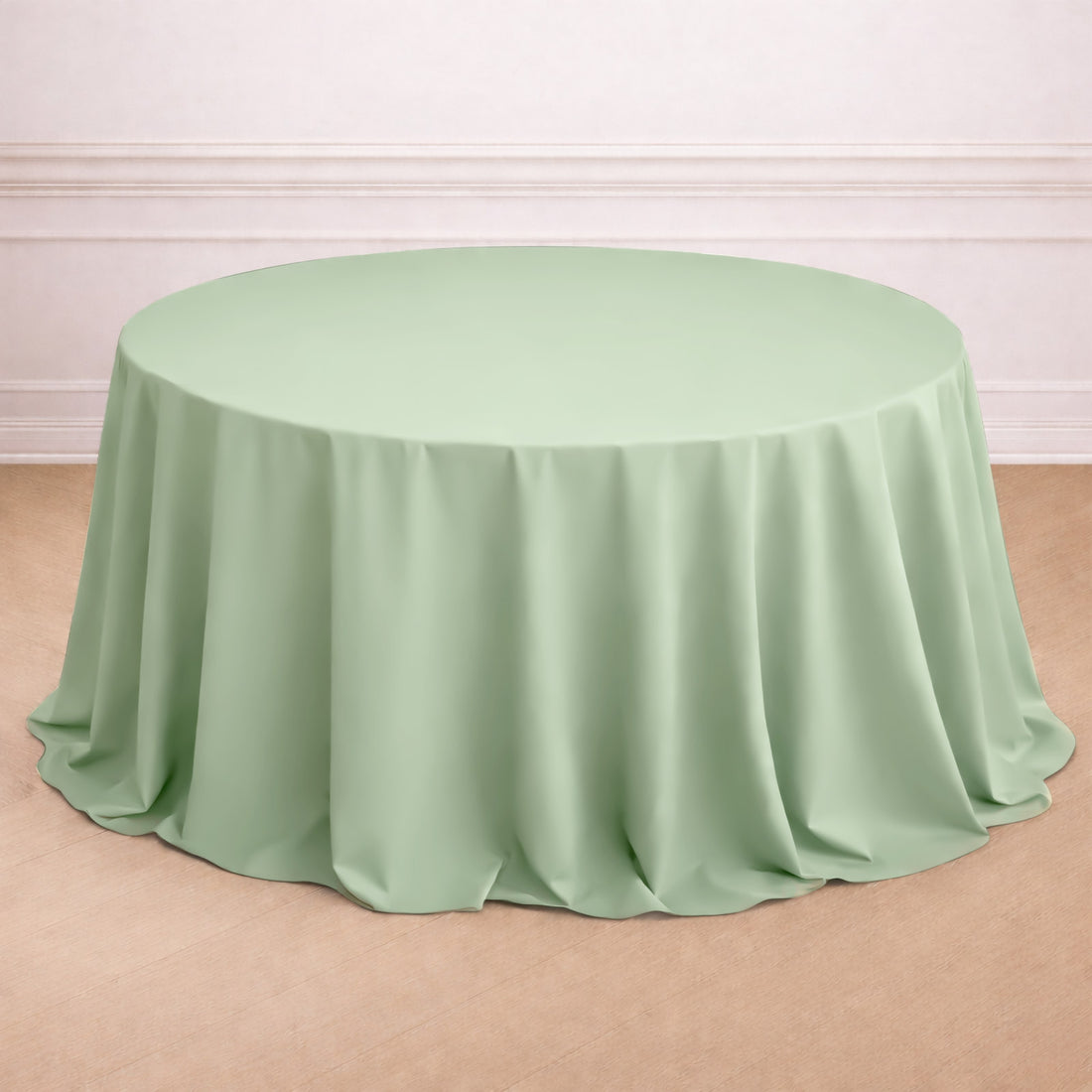 Sage green round tablecloth for elegant green and ivory table settings