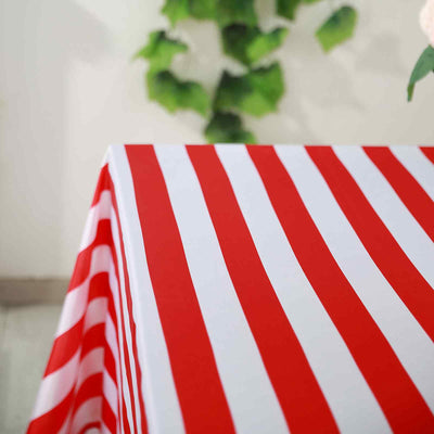 Red and white striped tablecloth draped elegantly over a table.