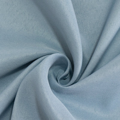 Soft blue fabric swirl texture for design and fashion projects.