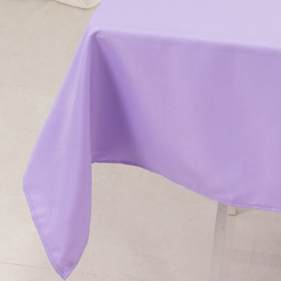 Purple tablecloth draped elegantly over a table edge.