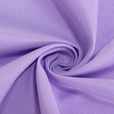 Purple fabric texture with a smooth, swirling pattern.