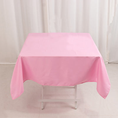 Pink tablecloth on a folding table