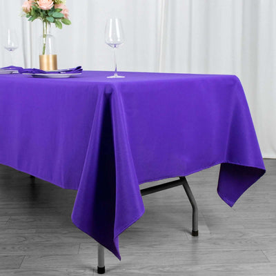 Purple tablecloth draped elegantly over a table in a stylish setting.