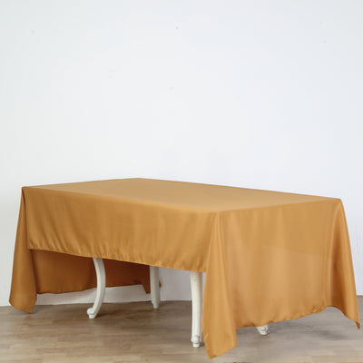Brown tablecloth on a wooden table against a plain background.