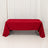 Red rectangular table with tablecloth against white curtain backdrop