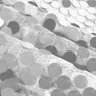 Silver sequin fabric with a shimmering texture. #whtbkgd
