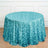 Sequin tablecloth in turquoise with a circular shape and flowing hemline.
