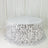 Round silver sequin table cover on a white backdrop.