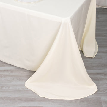 Create an Elegant Atmosphere with the Ivory Seamless Polyester Round Corner Rectangular Tablecloth
