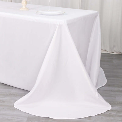 White tablecloth draped elegantly over a table.