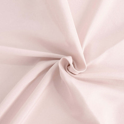 Soft pink fabric with a smooth texture and subtle drape.