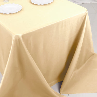 Beige tablecloth draped elegantly over a table.
