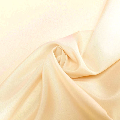 Soft peach satin fabric texture with elegant draping. #whtbkgd