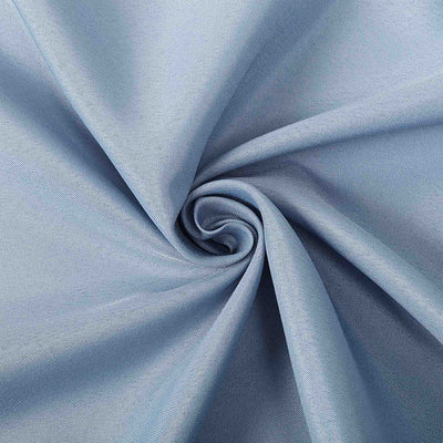 Light blue fabric texture with a smooth, woven finish.