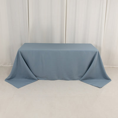 Blue tablecloth draped over a table in a studio setting.