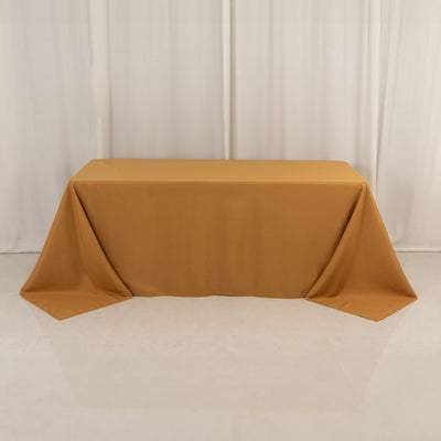 Brown tablecloth draped on a table against a neutral backdrop