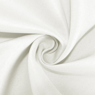White fabric texture in a swirling pattern.