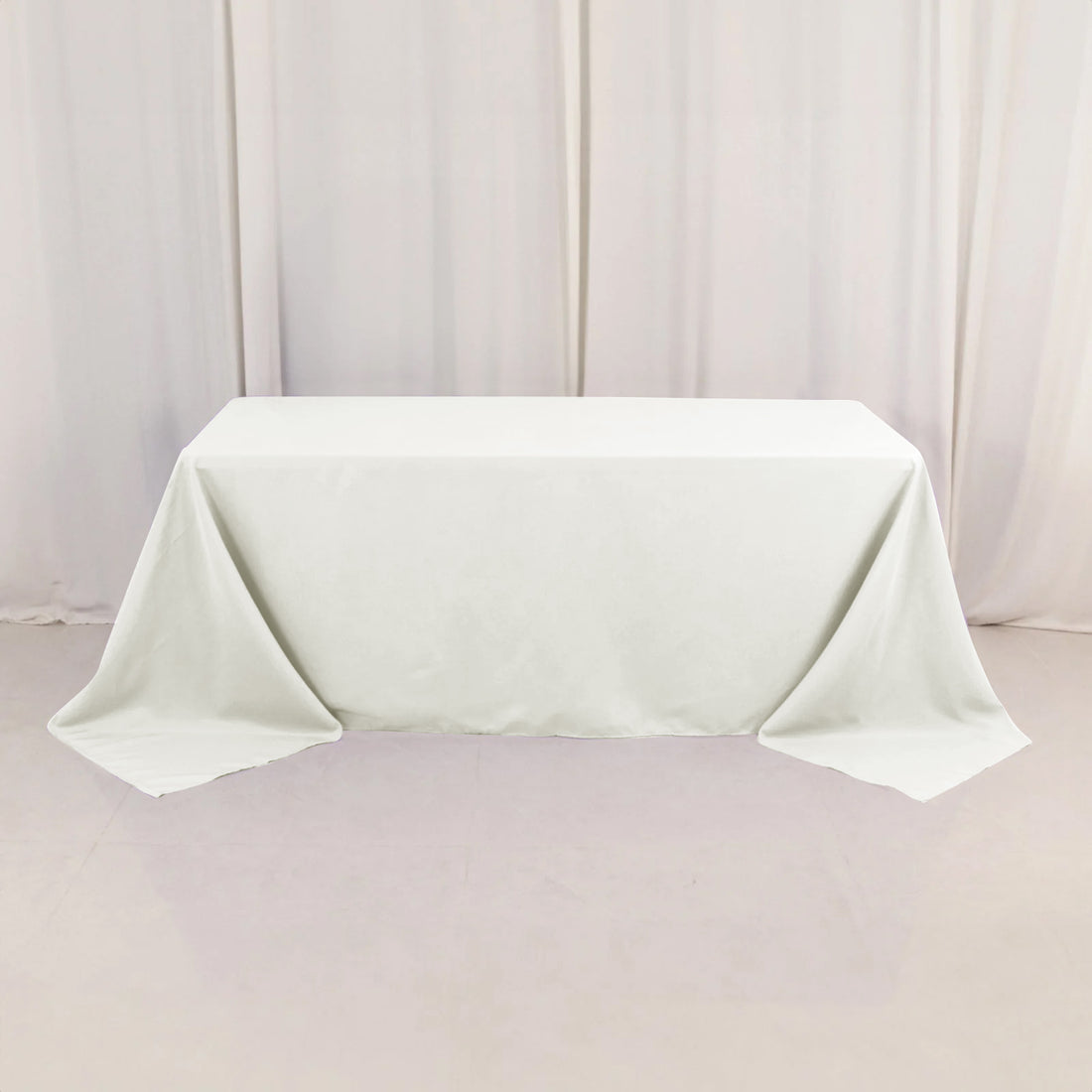 White tablecloth draped elegantly over a table