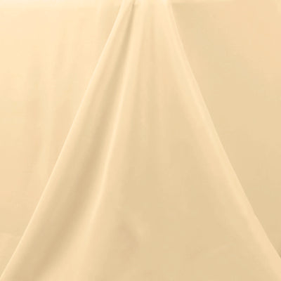 Beige fabric drape on a plain surface. #whtbkgd