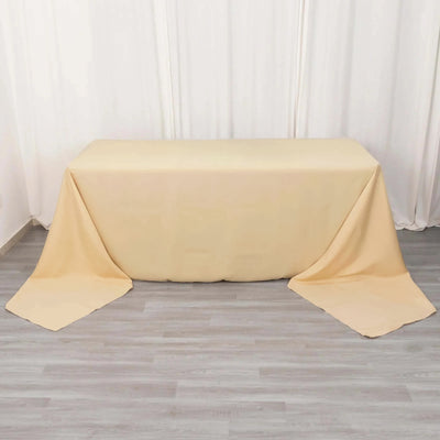 Beige table cover draped elegantly over a table.