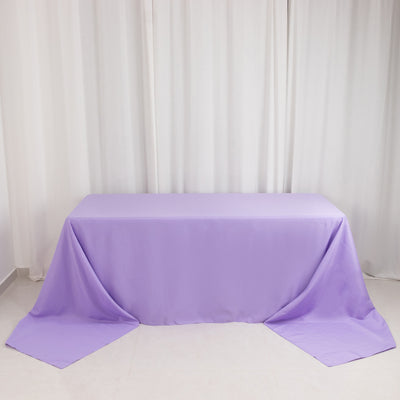 Lavender tablecloth draped over a table in a studio setting