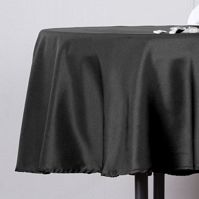 Black tablecloth draped elegantly over a table