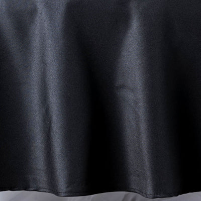 Black satin fabric draped elegantly, showcasing its smooth texture.