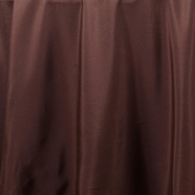 Brown textured fabric draped elegantly.