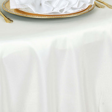 Create a Chic and Elegant Atmosphere with Ivory Seamless Polyester Round Tablecloth