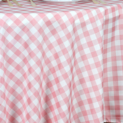 Pink and white gingham tablecloth on a table.