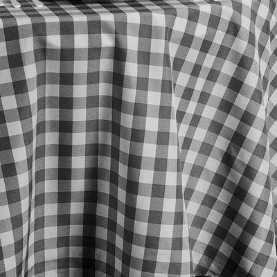 Gray and white gingham tablecloth draped elegantly.