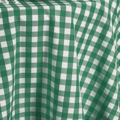 Green and white checkered tablecloth fabric draped elegantly.
