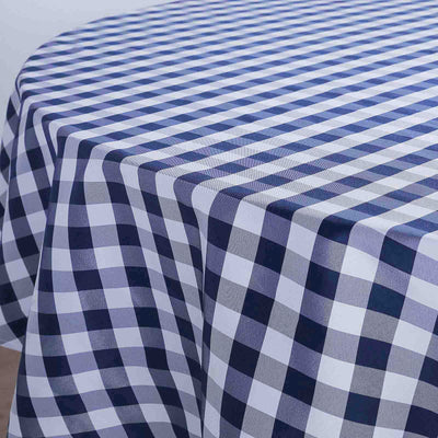 Navy and white checkered tablecloth on a wooden table.