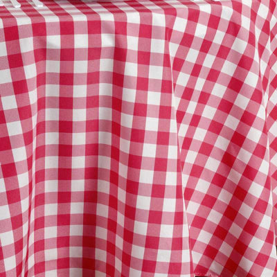 Red and white checkered tablecloth draping over a table.