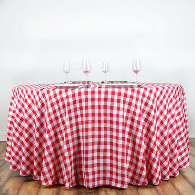 Red and white checkered tablecloth with glasses on a round table #whtbkgd