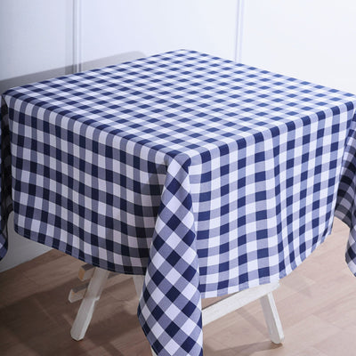 Navy and white checkered tablecloth on a wooden table