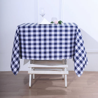 Navy and white checkered tablecloth on a wooden table.