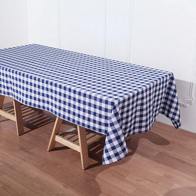Blue and white gingham tablecloth on wooden table.
