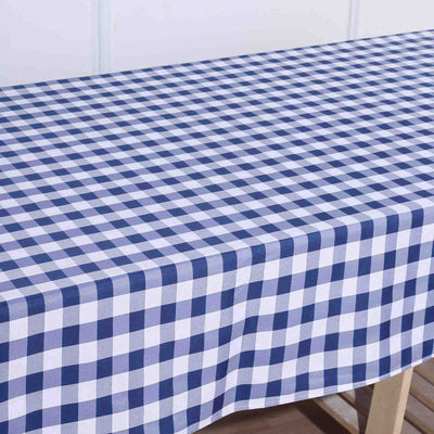 Navy and white checkered tablecloth on a wooden table