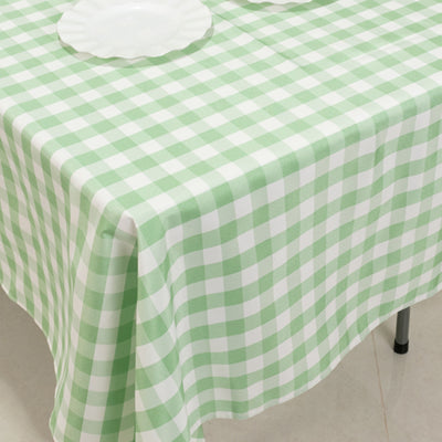 Green and white checkered tablecloth draped over a table.