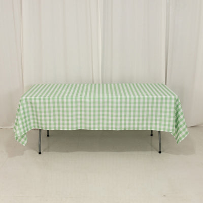 Green gingham tablecloth on a folding table