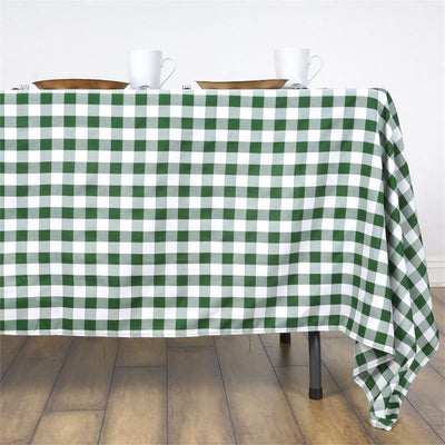 Green and white checkered tablecloth draped over a table