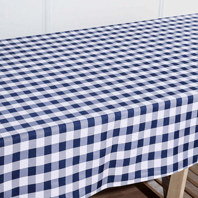 Navy and white checkered tablecloth on a wooden table.