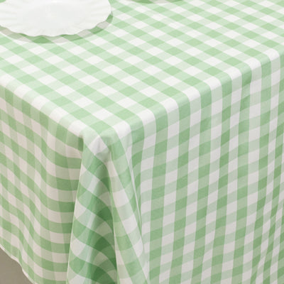 Green and white checkered tablecloth on a table.
