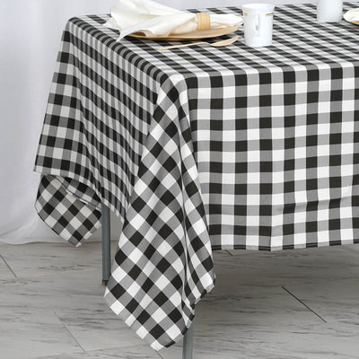 Black and white checkered tablecloth draped over a table.
