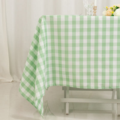 Green and white checked tablecloth on a table.